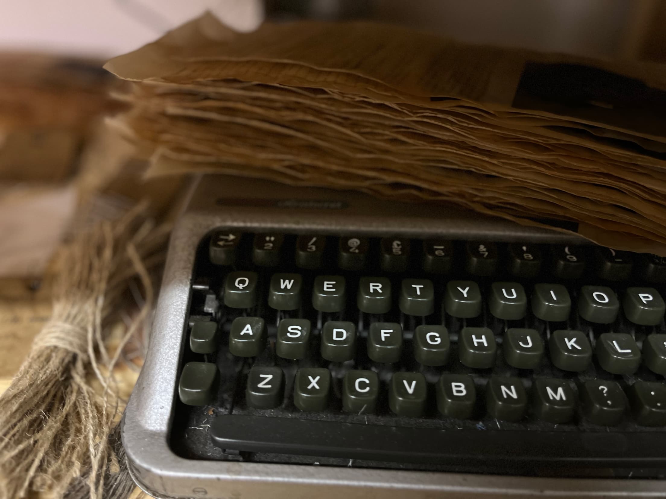 Preparing handmade labels using her typewriter